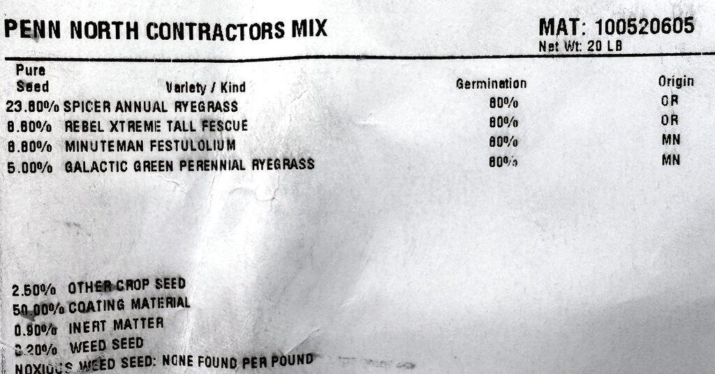 Grass seed tag showing 23.8 percent annual ryegrass and 50 percent coating material