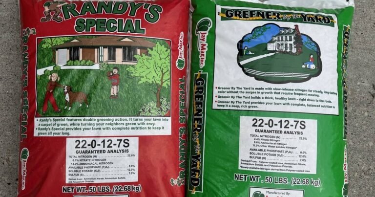 Two 50-pound Jay-Mar lawn fertilizer bags side by side, both labeled 22-0-12-7S